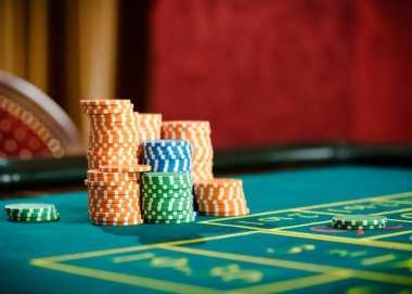 Our bosswd blackjack dealer table with cards and studio lighting